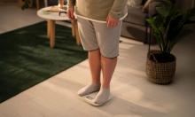 volwassene met overgewicht of obesitas op weegschaal